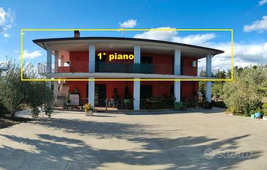 Appartamento con doppio terrazzo in bifamiliare