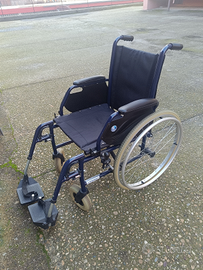 Carrozzina pieghevole