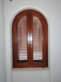 finestre in legno e persiane in ferro