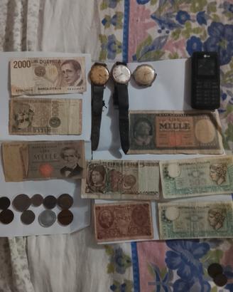 banconote monete e orologi antichi
