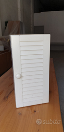 Mobiletto bianco con un'anta