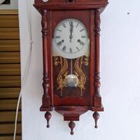 orologio a pendolo da parete