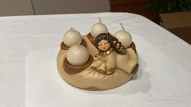 Centrotavola con candele Thun con Angelo