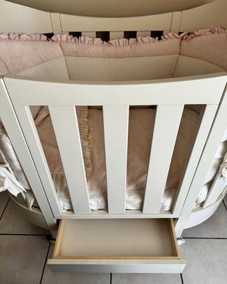 Culla ovale con cassetto  colore brige .