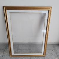 Cornice dorata in legno 