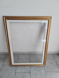 Cornice dorata in legno 