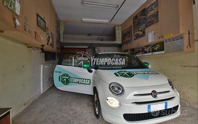 Garage finestrato con bagno