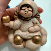 Angelo cuffia fine beije con cuore