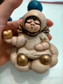 Angelo cuffia fine beije con cuore