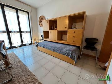 mobile in legno con letti