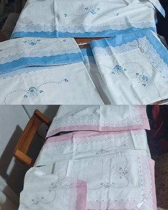 Completi da letto ricamati a mano 