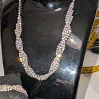 Parure di gioielli in acciaio e luminosi zirconi