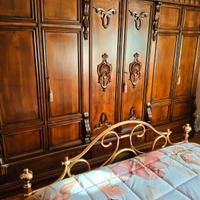 Armadio e letto matrimoniale in ottone