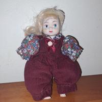 Bambola vintage in porcellana vestito a fiori