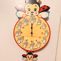 Orologio Grande Coccinella Mani - Bartolucci