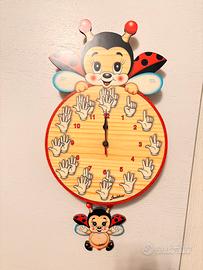 Orologio Grande Coccinella Mani - Bartolucci