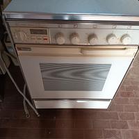 Cucina a gas 4 fuochi con forno elettrico e a gas