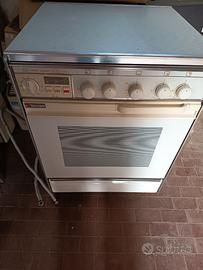 Cucina a gas 4 fuochi con forno elettrico e a gas