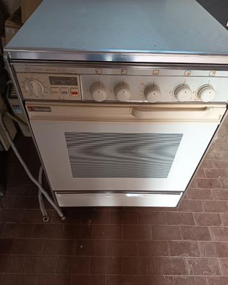 Cucina a gas 4 fuochi con forno elettrico e a gas