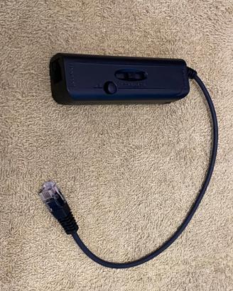 Adattatore universale per cuffie telefoniche