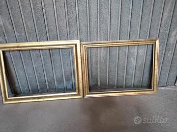 due cornici in legno dorate 