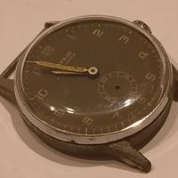 parti di meccanismo orologio vintage 