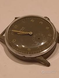 parti di meccanismo orologio vintage 