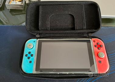 Nintendo switch + custodia + gioco