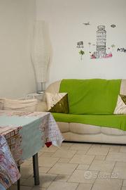 Trilocale con posto auto e giardino