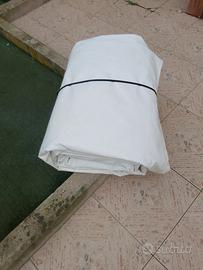 telo occhiellato bianco