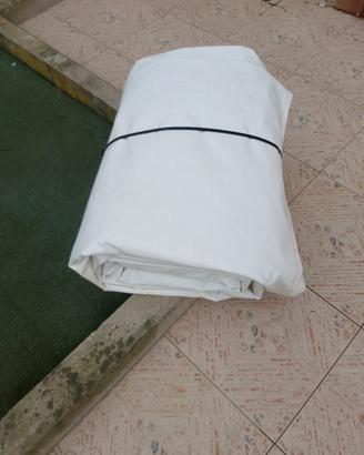 telo occhiellato bianco