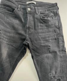 Jeans zara neri con toppe da strappi