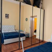 Armadio specchiato prodotto dal falegname