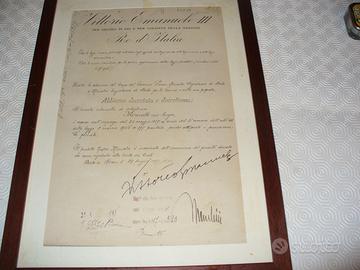 documento con firme Re e Mussolini