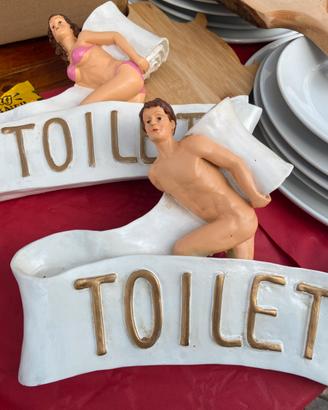 Insegna TOILET ironica