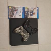 ps4 con due controller e due giochi