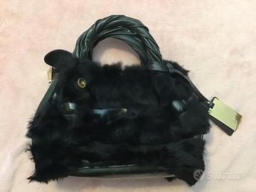 Borsa manicotto vintage Coccinelle