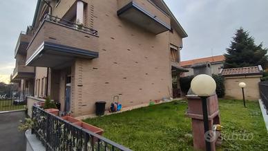 Trilocale con giardino e patio coperto