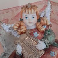 Soprammobile - angelo che suona la lira ad arpa