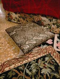 Poggiapiedi vintage pitonato.