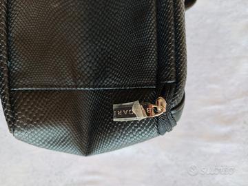 Pochette Bvlgari nuova mai usata con due difetti