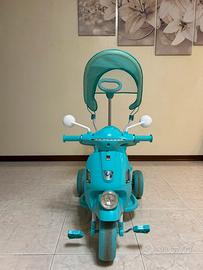 Triciclo 2 in uno ,vespa con luci e suoni