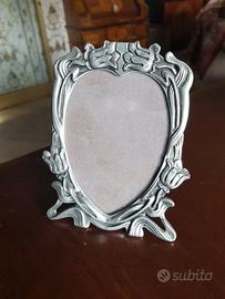 Bella cornice liberty in peltro