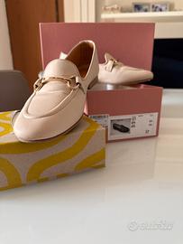 Mocassino cn morsetto nappa