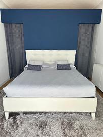 Letto matrimoniale in ecopelle bianco con cassone