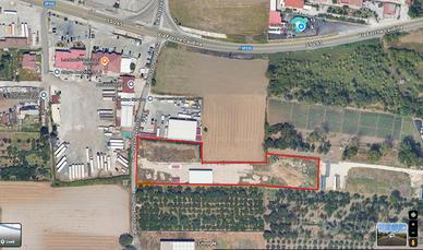 Capannone con area industriale