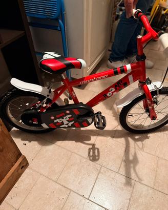 Bici Montana 16” rossa Tomy Toon con parafanghi