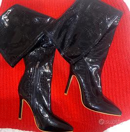 Stivali alti con il tacco in pelle