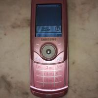 Samsung SGH-U700 rosa funzionante con cuffie