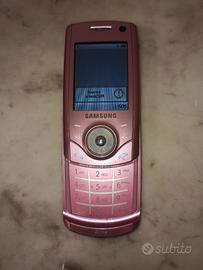 Samsung SGH-U700 rosa funzionante con cuffie